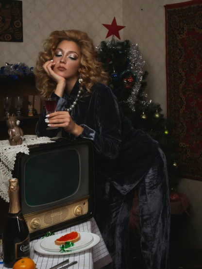 a woman sitting on a chair in front of a television, an album cover, trending on pexels, magic realism, wearing festive clothing, russian style, themed after wine, profile image