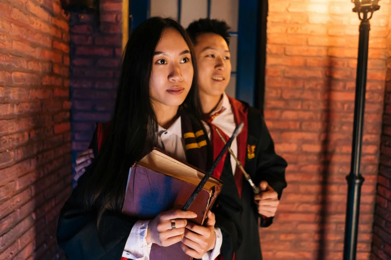 a couple of people standing next to each other, pexels contest winner, academic art, still from harry potter, a young asian woman, [ theatrical ], professional cosplay