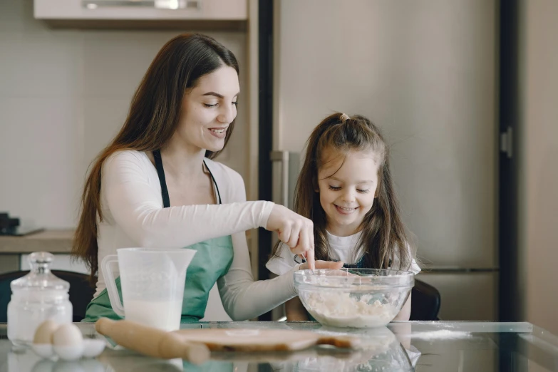 a woman and a little girl in a kitchen, pexels contest winner, avatar image, edible, pokimane, high quality image