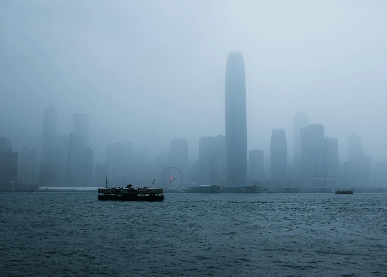 a boat in a body of water with a city in the background, by Tobias Stimmer, pexels contest winner, rain and haze, jeremy cheung, harbour, skyline showing