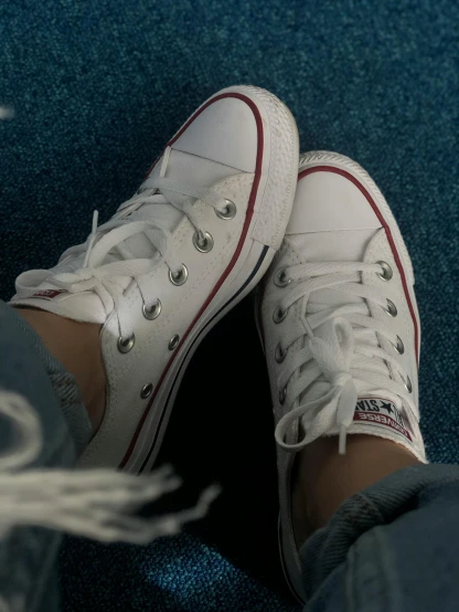 a pair of white sneakers sitting on top of a blue carpet, trending on pexels, sots art, wearing red converse shoes, wearing white clothes, ansel ], avatar image