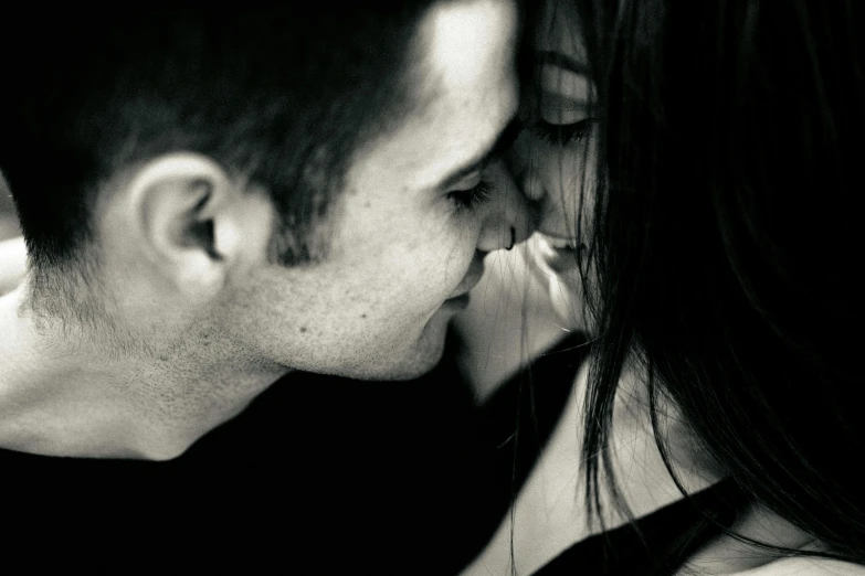 a black and white photo of a man kissing a woman, a black and white photo, pexels, close-up!!!!!, boy and girl, illustration »