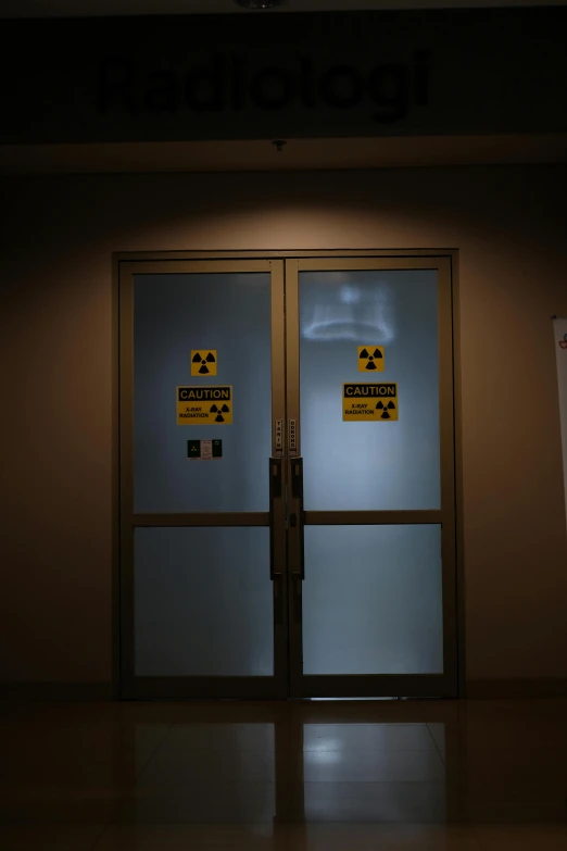 a couple of glass doors sitting inside of a building, a picture, flickr, nuclear art, # nofilter, doctors office, radioactive swamp, taken in 2 0 2 0