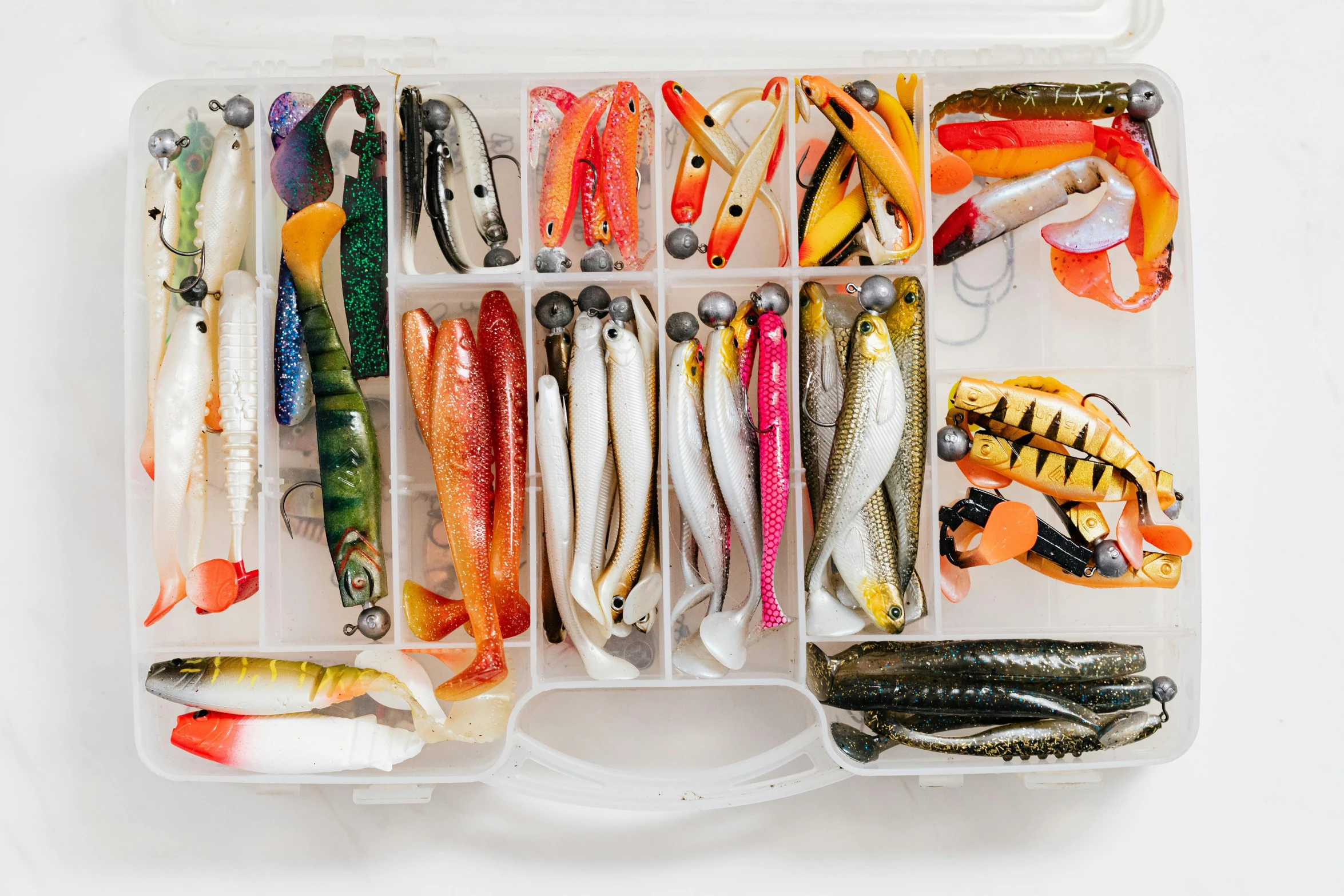 a box filled with different types of fishing lures, trending on pexels, flat lay, ilustration, 2000s photo