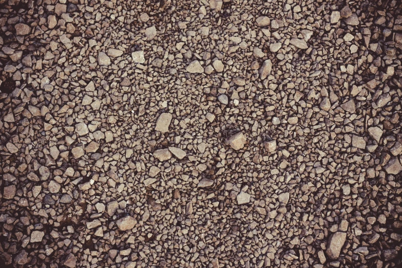 a black and white photo of rocks and gravel, an album cover, unsplash, minimalism, brown colours, seamless texture, highly detailed # no filter, tar roads