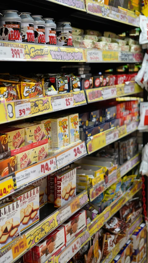 a store filled with lots of different types of food, by Yasushi Sugiyama, pexels, toyism, yellow and red, nostalgic 8k, square, waist high