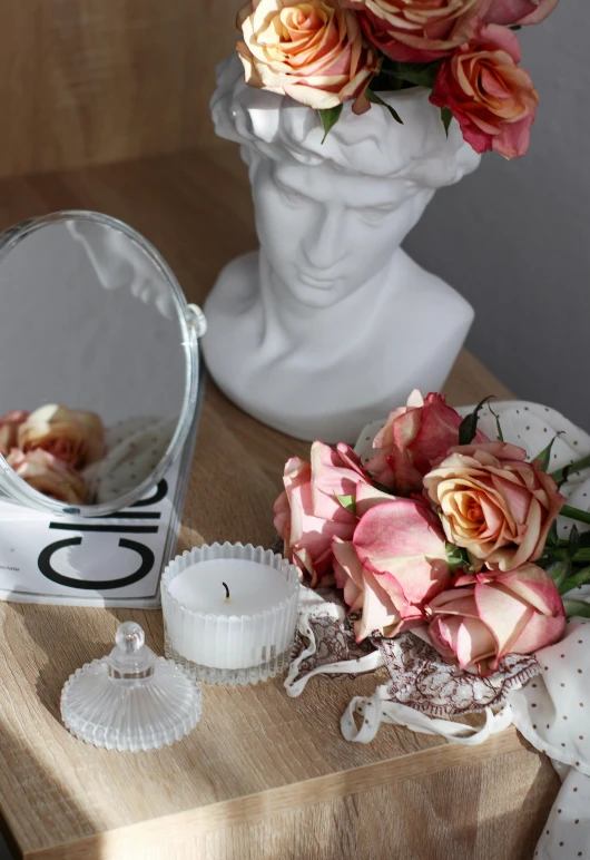 a vase filled with flowers sitting on top of a wooden table, face accessories, with a mirror, detailed product shot, roses