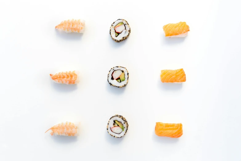 a variety of sushi on a white surface, inspired by Tōshi Yoshida, unsplash, minimalism, orange grey white, prawn, infinite, precious gems