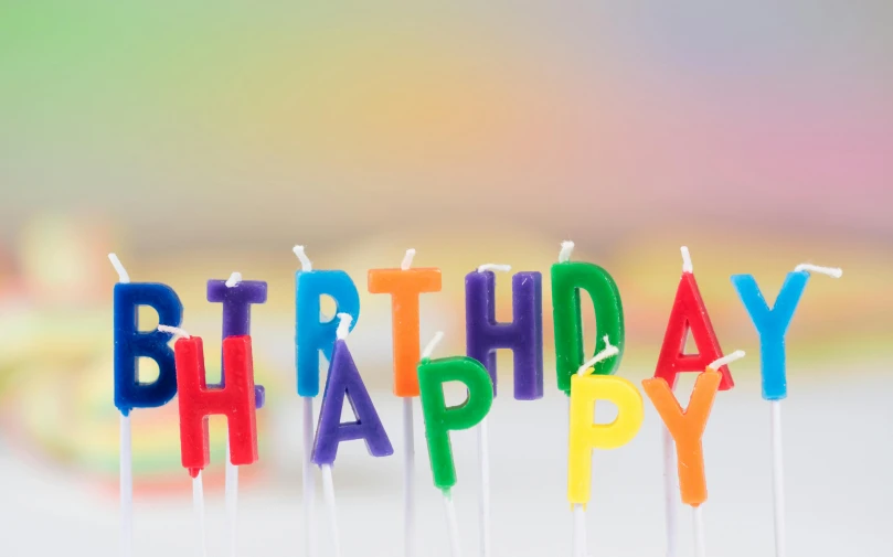 a cake with candles that say happy birthday, pexels, brightly coloured, background image, waxy candles, letters