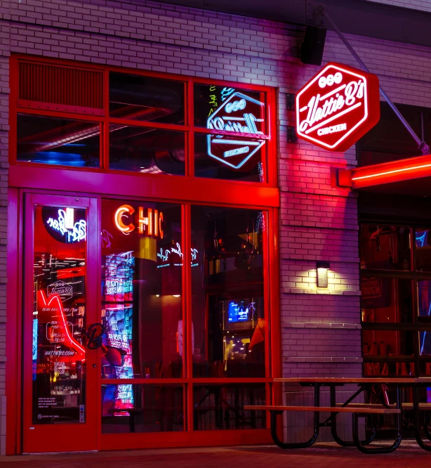 a red neon sign sitting on the side of a building, sitting alone at a bar, lumnious, fan favorite, at night