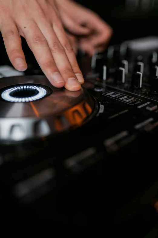 a close up of a person using a dj controller, an album cover, 15081959 21121991 01012000 4k, high quality picture, smooth metal, round format