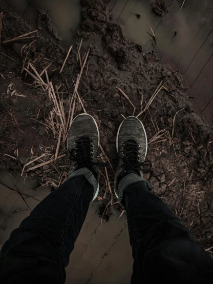 a person standing in the mud with their shoes on, a picture, creepy aesthetic, profile image, worm's eye view from the floor, a wooden