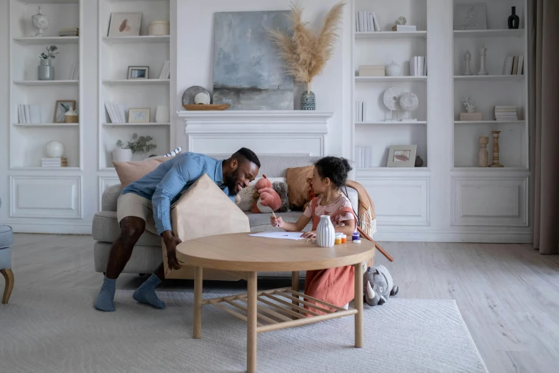 a man and woman sitting on a couch in a living room, a child's drawing, pexels contest winner, luxurious wooden coffee table, toddler, people at the table, product introduction photo