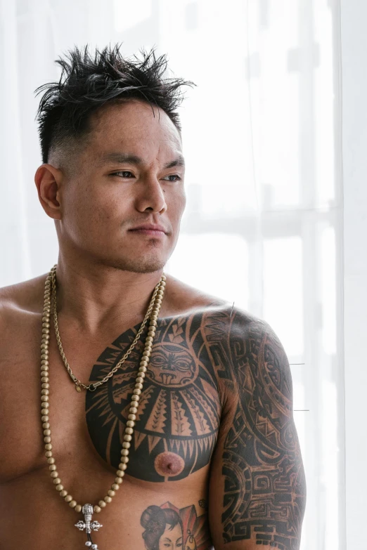 a man with a cross tattoo on his chest, a tattoo, inspired by Byron Galvez, visual art, wearing a low cut tanktop, inuit heritage, asian man, lgbtq