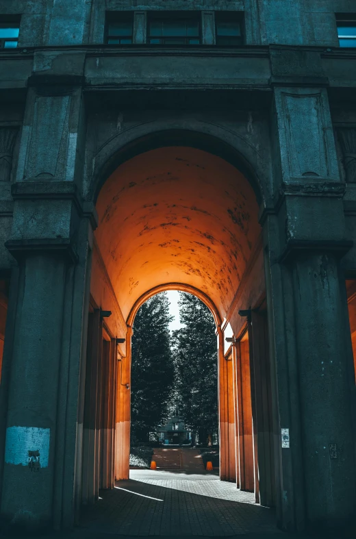 a very tall building with a clock on it's side, unsplash contest winner, visual art, an archway, orange lights, naples, a park