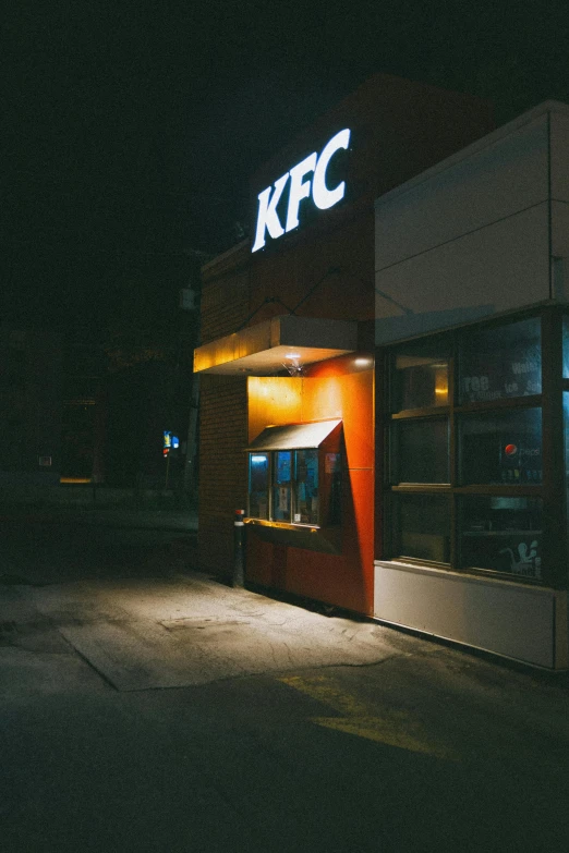 a fast food restaurant lit up at night, a stock photo, by Matt Cavotta, unsplash contest winner, graffiti, kfc chicken, slightly minimal, liquid gold, photo taken on fujifilm superia