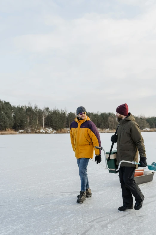 a group of people walking across a snow covered field, by Veikko Törmänen, seafood in preserved in ice, near a lake, 2 people, wine