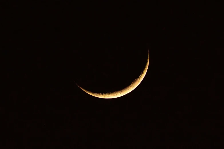 a crescent in the dark sky, flickr, hurufiyya, smiling slightly, golden curve composition, instagram picture, 2 0 0 mm telephoto