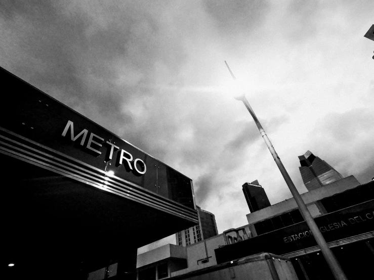 a black and white photo of a metro station, flickr, auckland sky tower, square, burnt, memphis