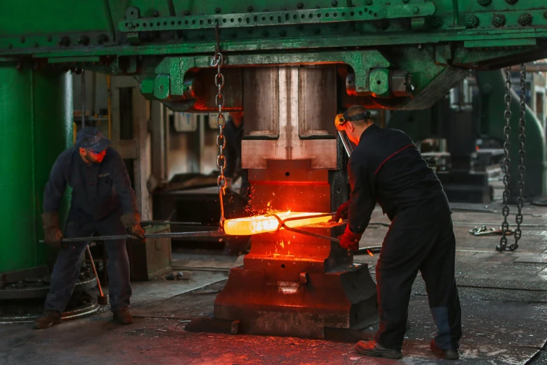 a group of men working in a factory, pexels contest winner, thors hammer, cast iron material, avatar image