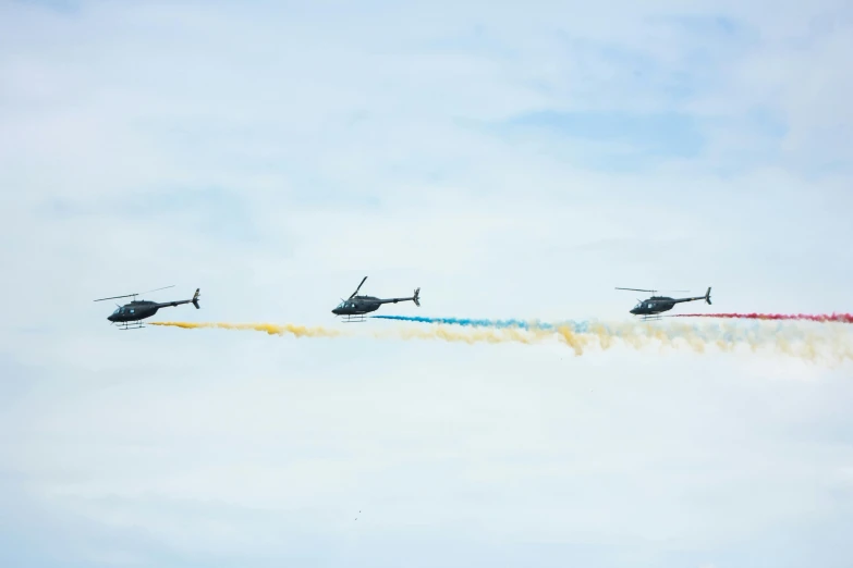 a group of four helicopters flying through a blue sky, a portrait, pexels contest winner, avatar image, festivals, uniform off - white sky, profile image