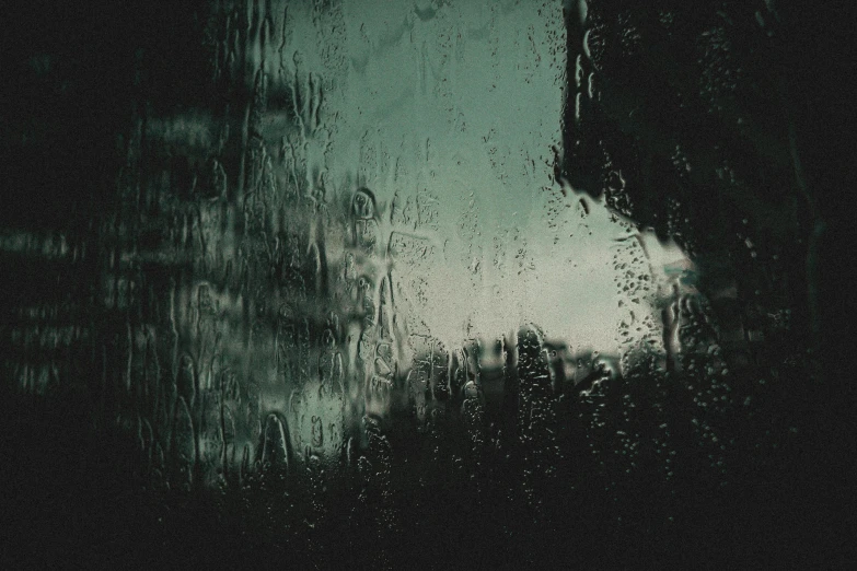 a close up of a window with rain on it, an album cover, tonalism, ☁🌪🌙👩🏾, dark green water, concerned, album