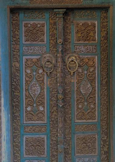 a close up of a door on a building, hurufiyya, intricate detailed 8 k, ornate furniture, blue, intricate writing