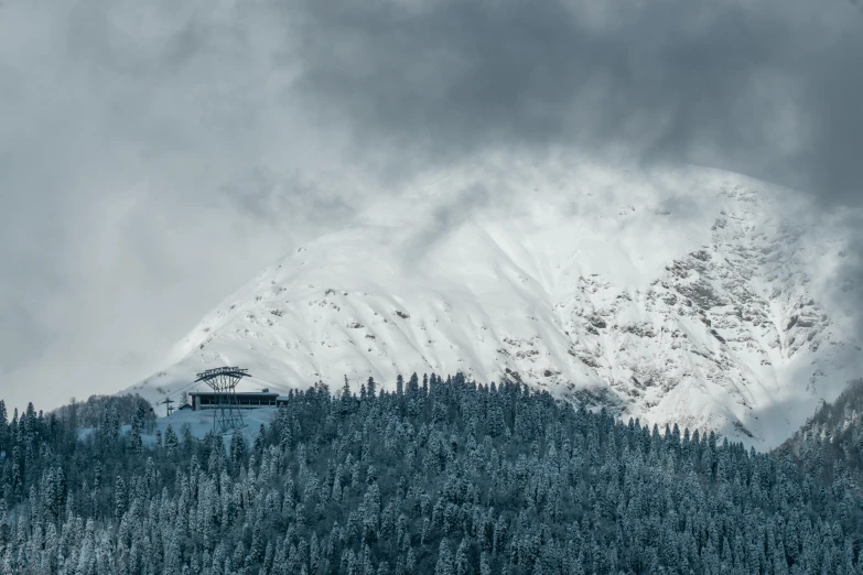 a mountain covered in snow under a cloudy sky, by Matthias Weischer, pexels contest winner, baroque, cafe in the clouds, whistler, thumbnail, nuclear winter