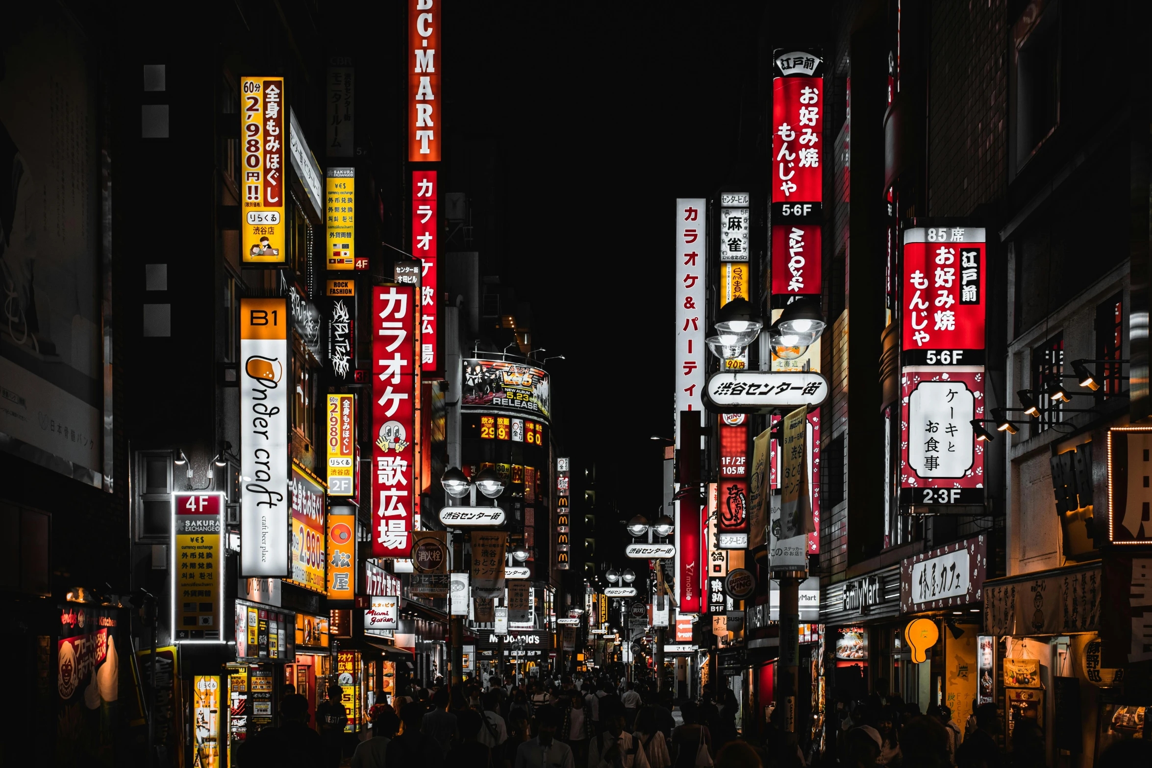 a group of people walking down a street at night, inspired by Kanō Hōgai, pexels contest winner, signboards, with japanese inspiration, bright signage, ethnicity : japanese