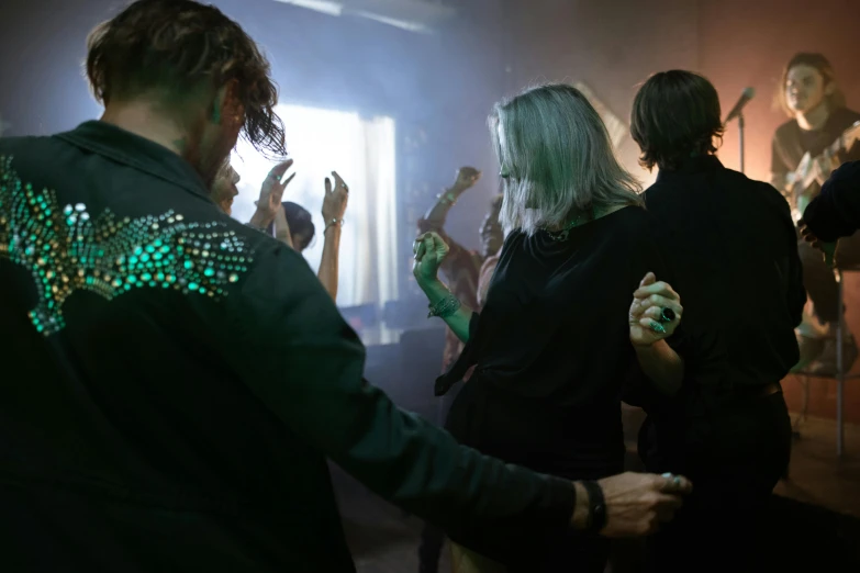 a group of people that are standing in a room, inspired by Elsa Bleda, visual art, goth people dancing, green lights, party, profile image