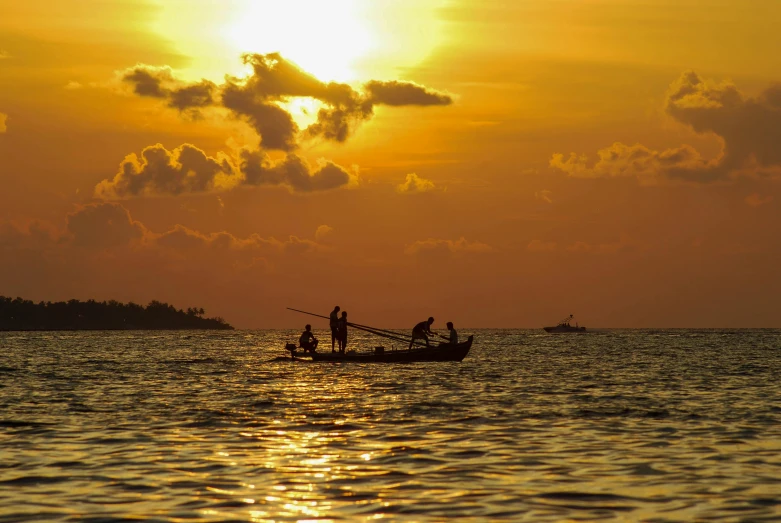 a group of people riding on top of a boat in the ocean, by Sam Dillemans, pexels contest winner, romanticism, fishing boat, evening sun, thumbnail, fishing village