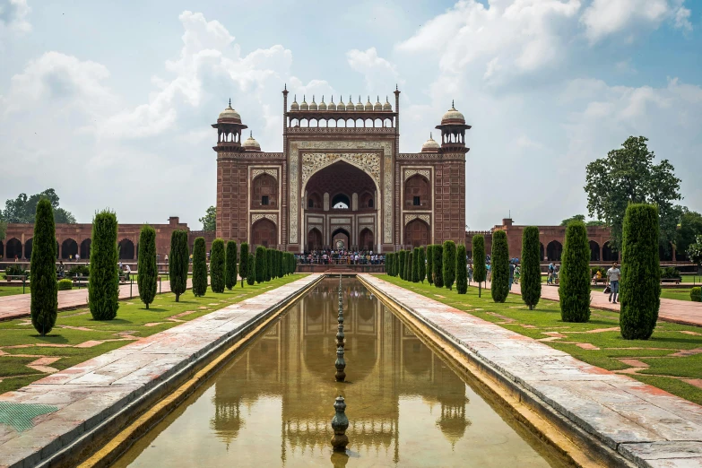 a long reflecting pool in front of a building, a marble sculpture, inspired by Steve McCurry, unsplash contest winner, renaissance, taj mahal, thumbnail, golden gates, mogul khan