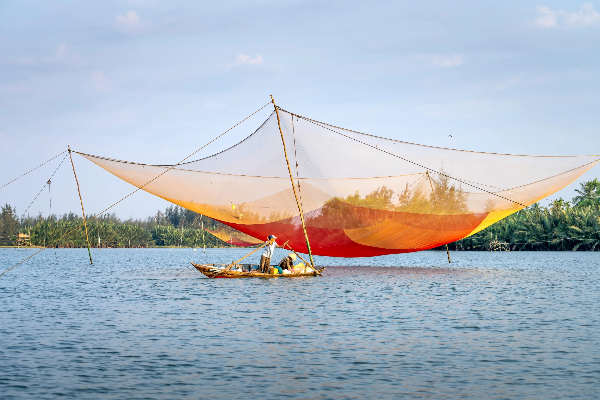 a couple of boats that are in the water, an album cover, by Daniel Lieske, pexels contest winner, gutai group, vietnam, netting, promo image, olafur eliasson