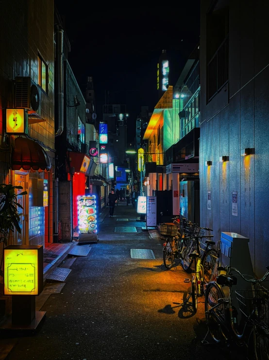 a street filled with lots of bikes next to tall buildings, unsplash contest winner, ukiyo-e, quiet tokyo alley at night, neon shops, 2022 photograph, ilustration