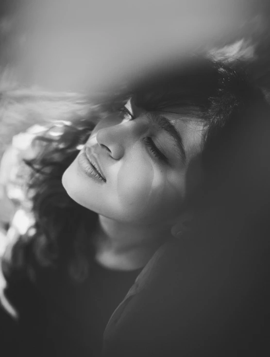 a black and white photo of a woman with her eyes closed, pexels contest winner, portrait of priyanka chopra, dreamy mood, cynthwave, instagram photo