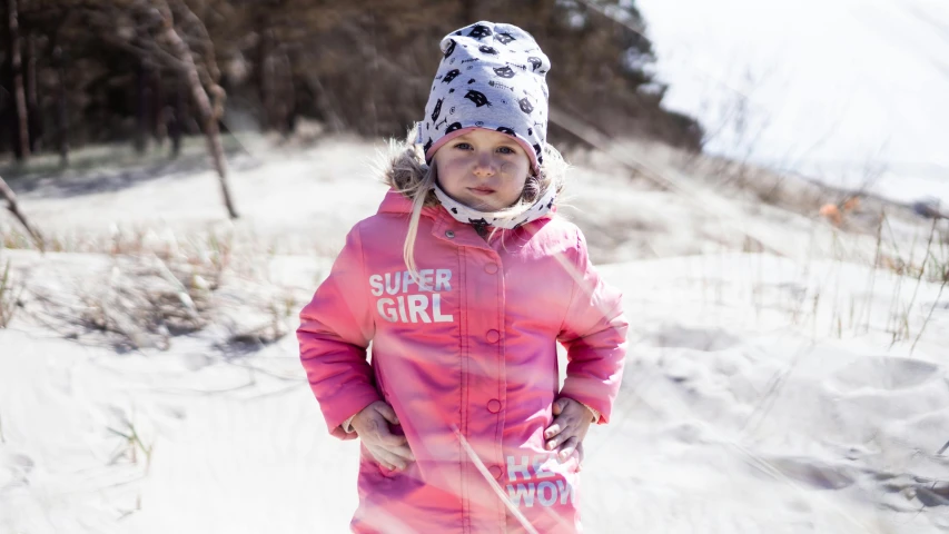 a little girl that is standing in the snow, a portrait, inspired by Louisa Matthíasdóttir, unsplash, graffiti, on a sunny beach, action shot girl in parka, supergirl, pink