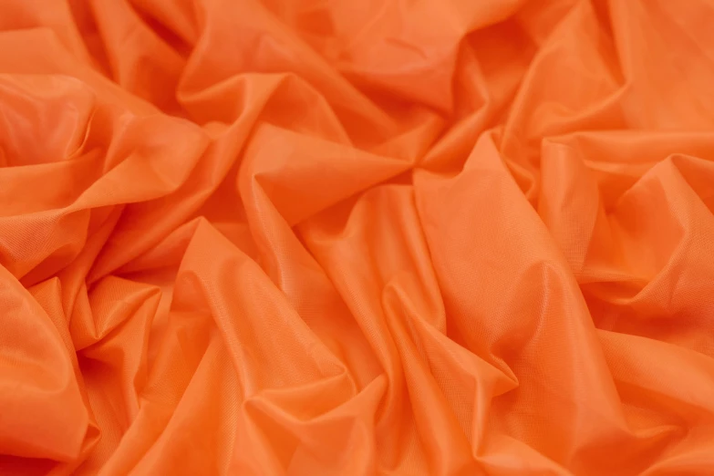 a close up view of an orange fabric