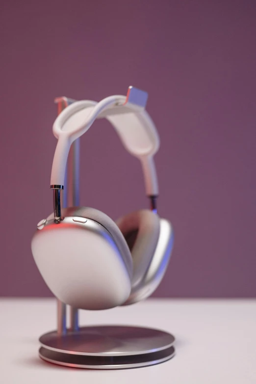 a close up of a pair of headphones on a stand, a digital rendering, by jeonseok lee, gradient white to silver, pixar render, gadget hackwrench, made of high tech materials