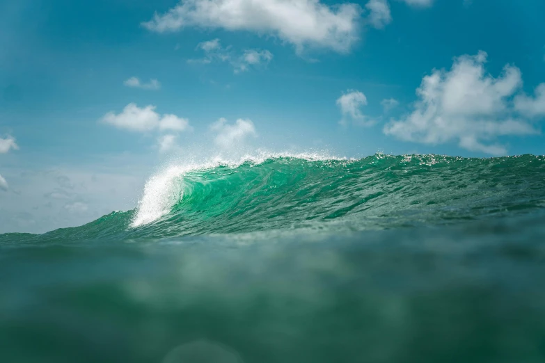 a man riding a wave on top of a surfboard, pexels contest winner, renaissance, cyan and green, photo of the middle of the ocean, o'neill cylinder, rectangle