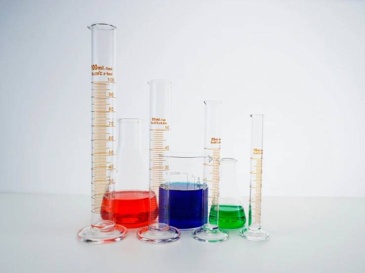 a group of different colored liquids sitting next to each other, beaker, 155 cm tall, measurements, detailed product image