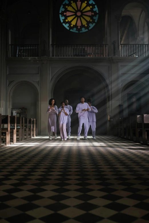 a group of people that are standing in a church, an album cover, by Jan Tengnagel, pexels contest winner, wearing white clothes, dramatic movie still, [ theatrical ], france