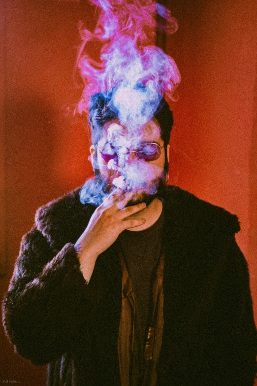 a man with smoke coming out of his mouth, an album cover, inspired by Elsa Bleda, pexels contest winner, just take a pinch of psychedelic, flame in the fur, zachary corzine, bad bunny