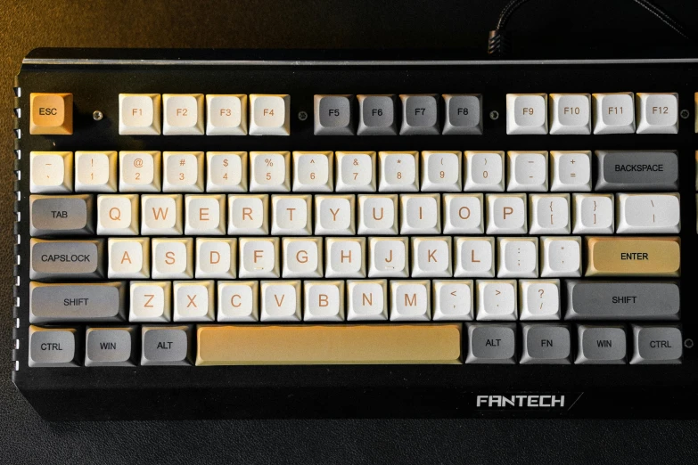 a computer keyboard sitting on top of a table, inspired by František Kaván, featured on reddit, synthetism, white and gold color scheme, battletech style, front lit, vintage - w 1 0 2 4