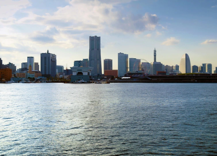 a large body of water with a city in the background, pexels contest winner, sōsaku hanga, skyline showing, dezeen, slide show, viewed from the harbor