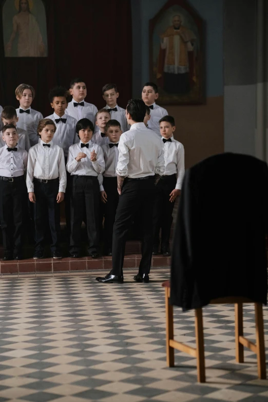 a group of young men standing in front of a choir, beautiful boy, 2020, ignant, private school