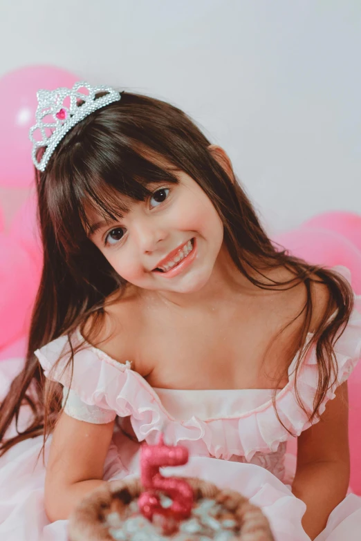a little girl sitting in front of a birthday cake, by Lilia Alvarado, pexels contest winner, smiling as a queen of fairies, isabela moner, in a fancy dress, avatar image