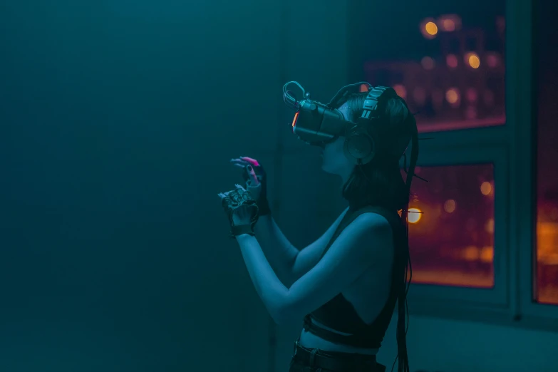 a woman standing in front of a window holding a cell phone, cyberpunk art, unsplash contest winner, interactive art, wearing a vr-headset, in a nightclub, underwater, cinematic outfit photo