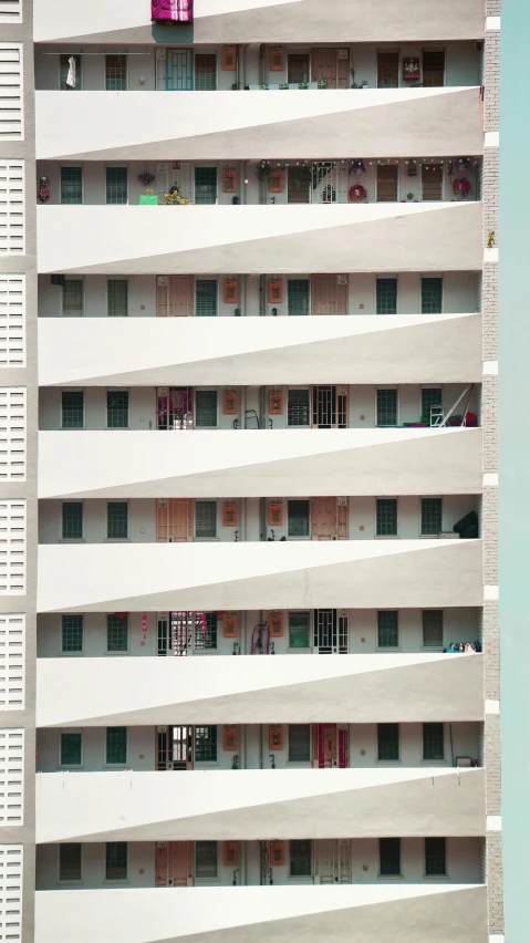 a tall white building with lots of windows, pexels contest winner, flat colour, frank moth, balconies, leng jun