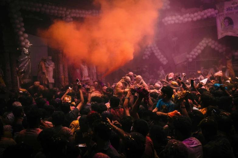 a crowd of people standing on top of a stage, pexels contest winner, process art, indian temple, pink smoke, colour print, thumbnail