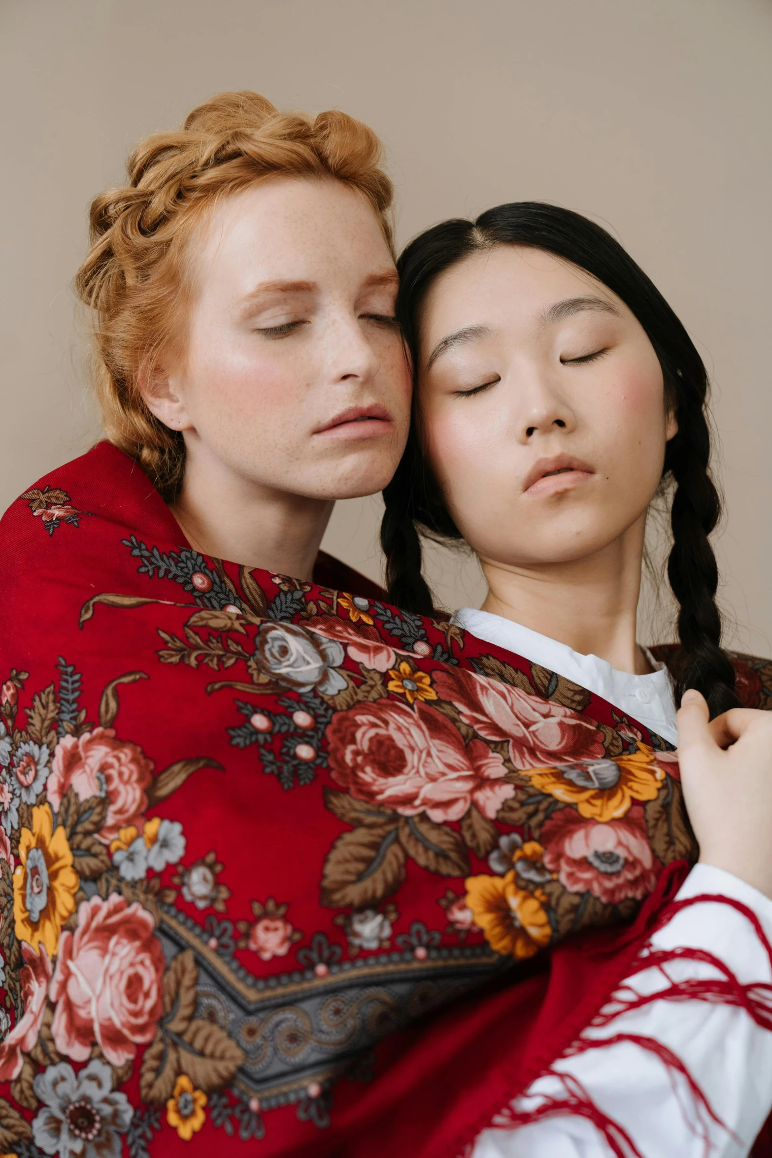 a couple of women standing next to each other, inspired by Lucas Cranach the Elder, trending on pexels, covered with blanket, jingna zhang, lesbian embrace, laura letinsky and steve mccurry